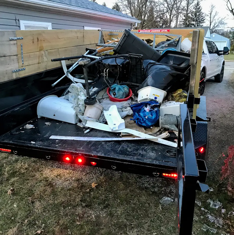 Roll-off dumpster delivered to a residential driveway in Rushville